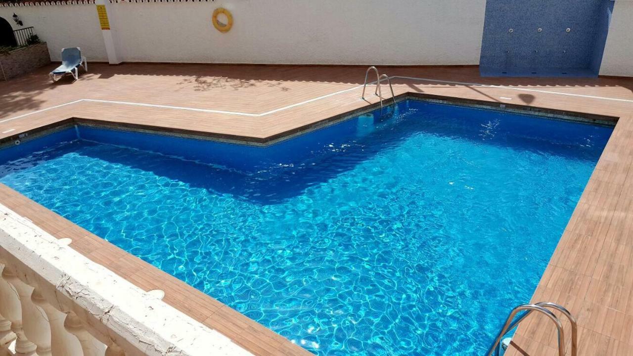 Apartamentos San Antonio ตอร์เรโมลิโนส ภายนอก รูปภาพ